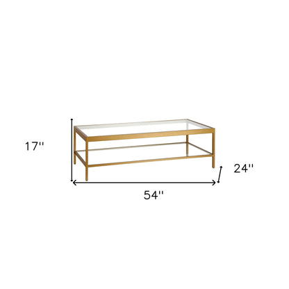 Table basse en verre et acier transparent et doré de 54 po avec étagère