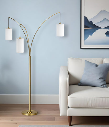 83" Brass Three Light Tree Floor Lamp With White Frosted Glass Drum Shade