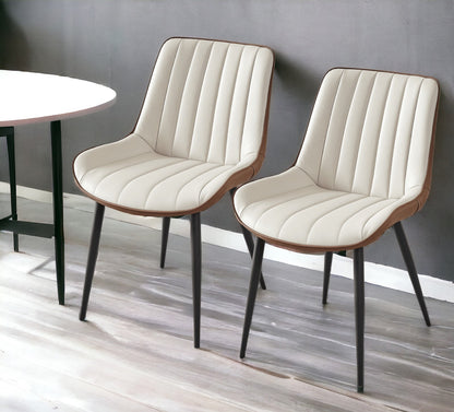 Ensemble de deux chaises de salle à manger en tissu rembourré beige et noir