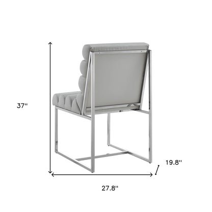 Ensemble de deux chaises de salle à manger capitonnées en similicuir métallisé gris et argent