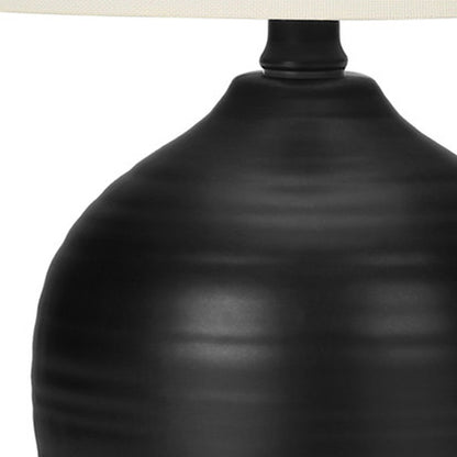 Lampe de table ronde en céramique noire de 17 po avec abat-jour tambour ivoire