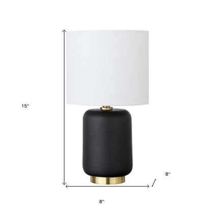 Lampe de table cylindrique en céramique noire et dorée de 15 po avec abat-jour tambour blanc